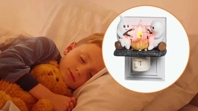 Chase away the chills with the Campfire Haunt Flicker Nightlight