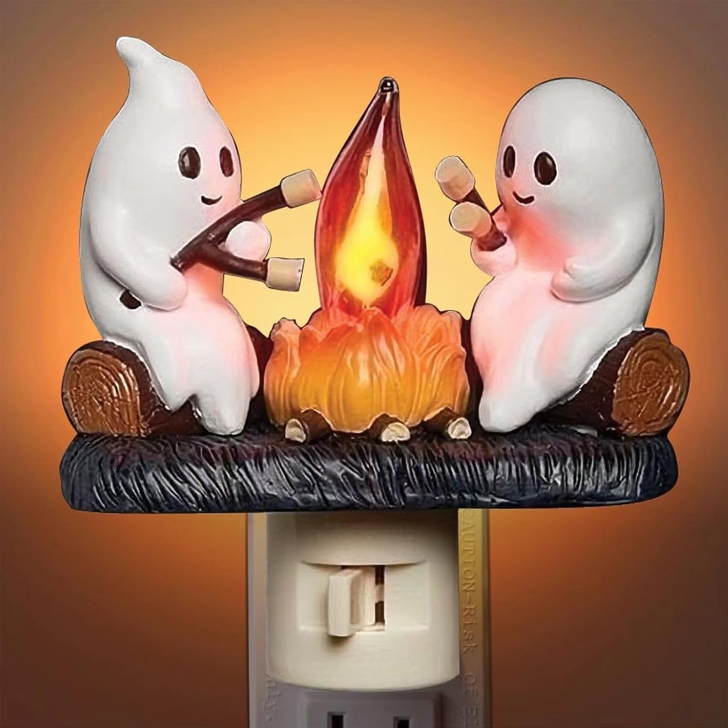 Chase away the chills with the Campfire Haunt Flicker Nightlight