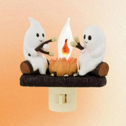 Chase away the chills with the Campfire Haunt Flicker Nightlight