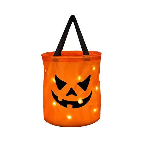 Light Up Trick or Treating With The Smile & Teeth Glow Pumpkin Candy Bags