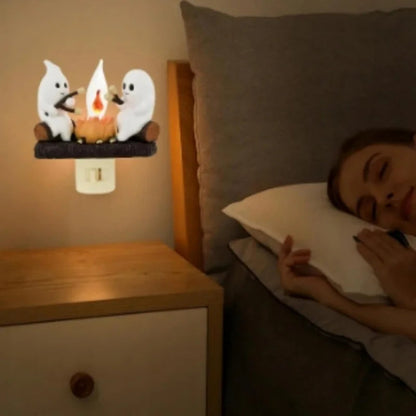 Chase away the chills with the Campfire Haunt Flicker Nightlight